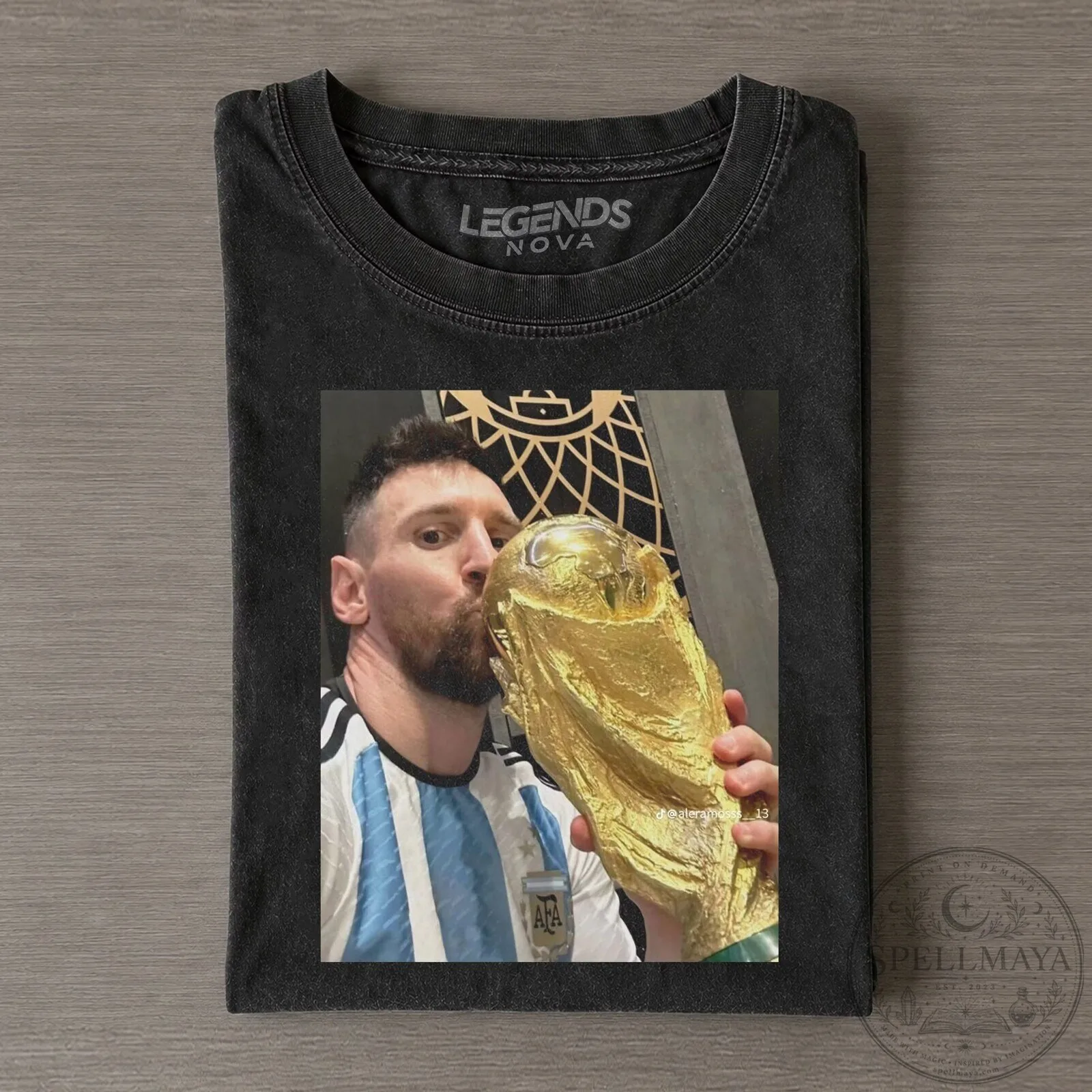 Black Graphic Tee Featuring Lionel Messi's World Cup Kiss Design